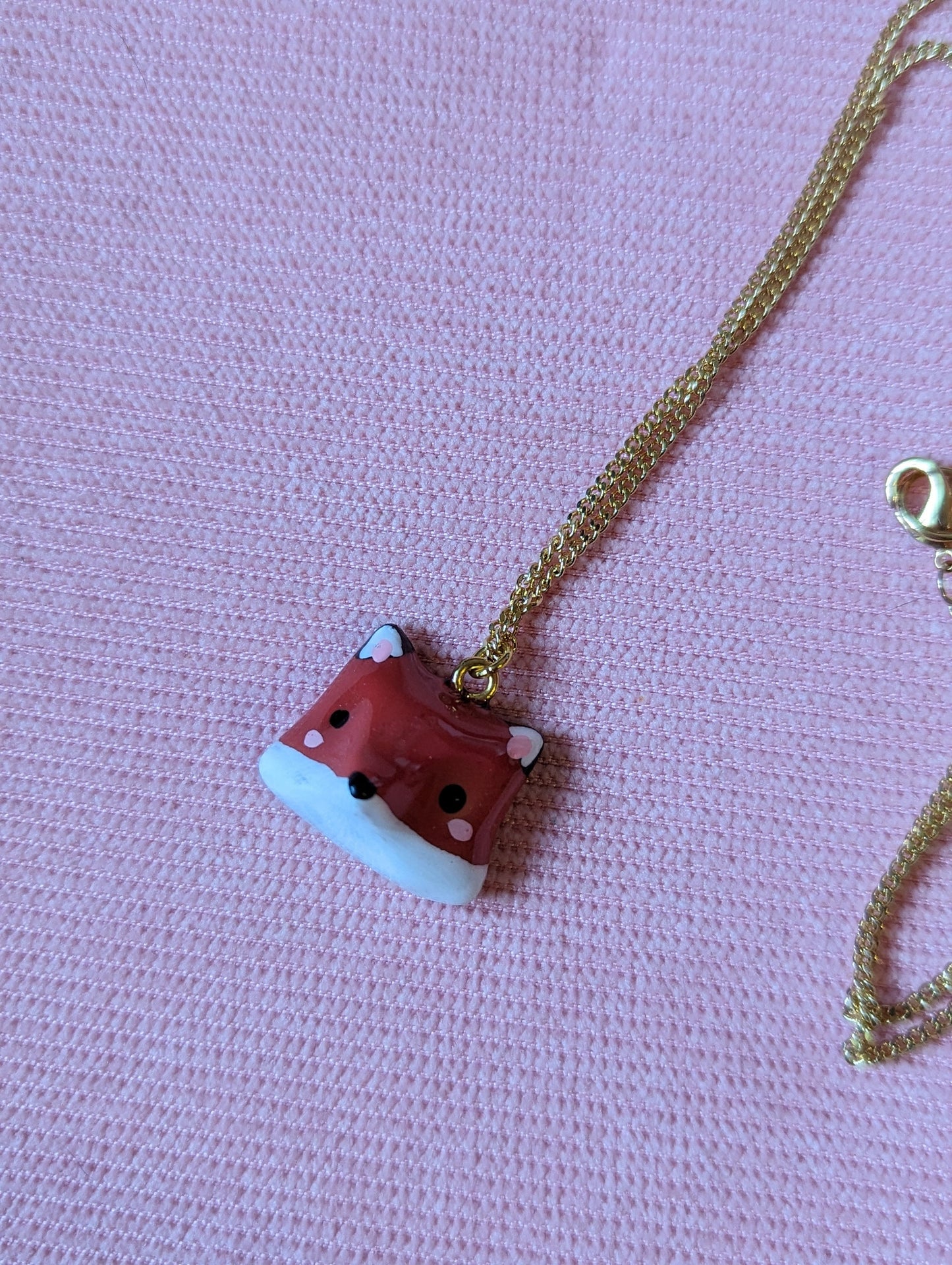 Collier orné d'une tête de renard