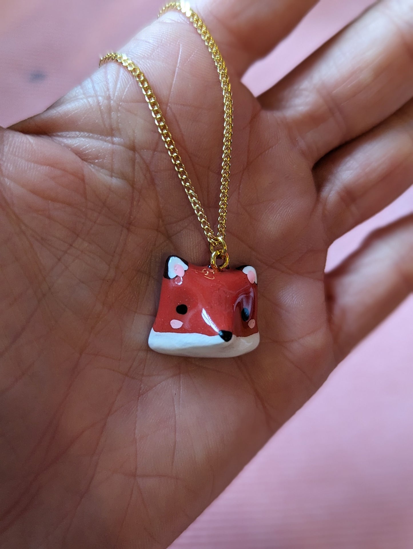 Collier orné d'une tête de renard
