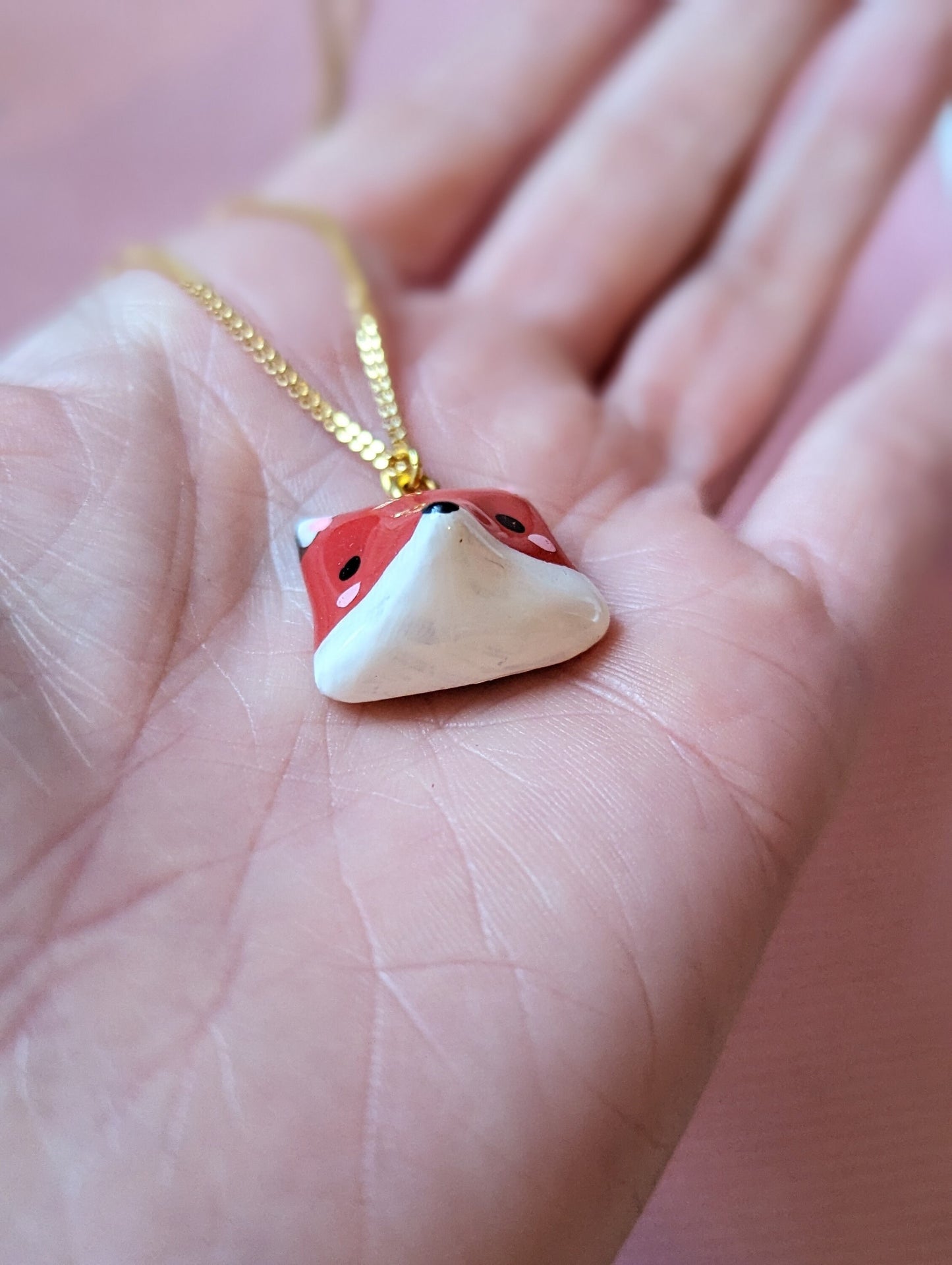 Collier orné d'une tête de renard