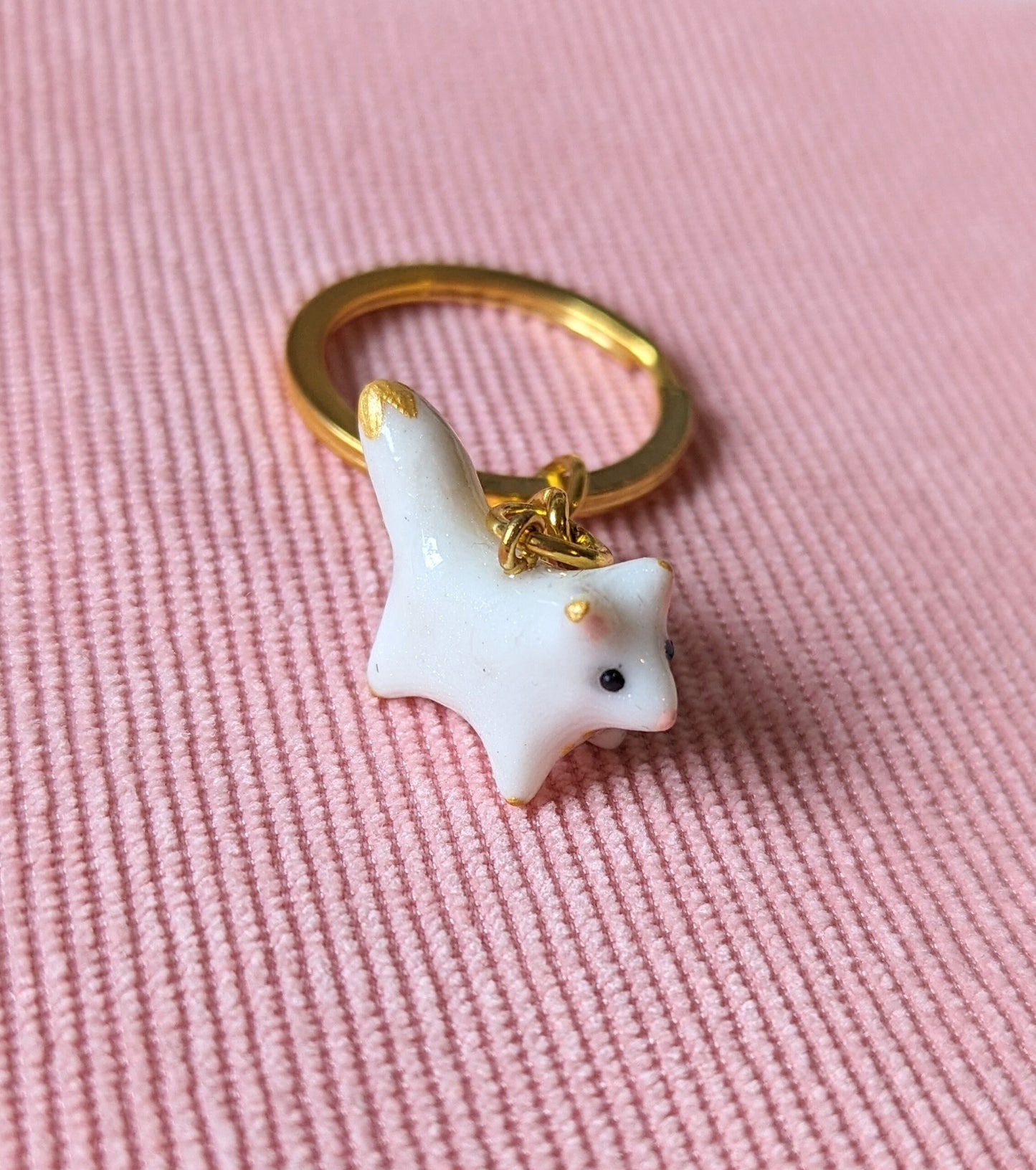 porte clé doré mini renard polaire