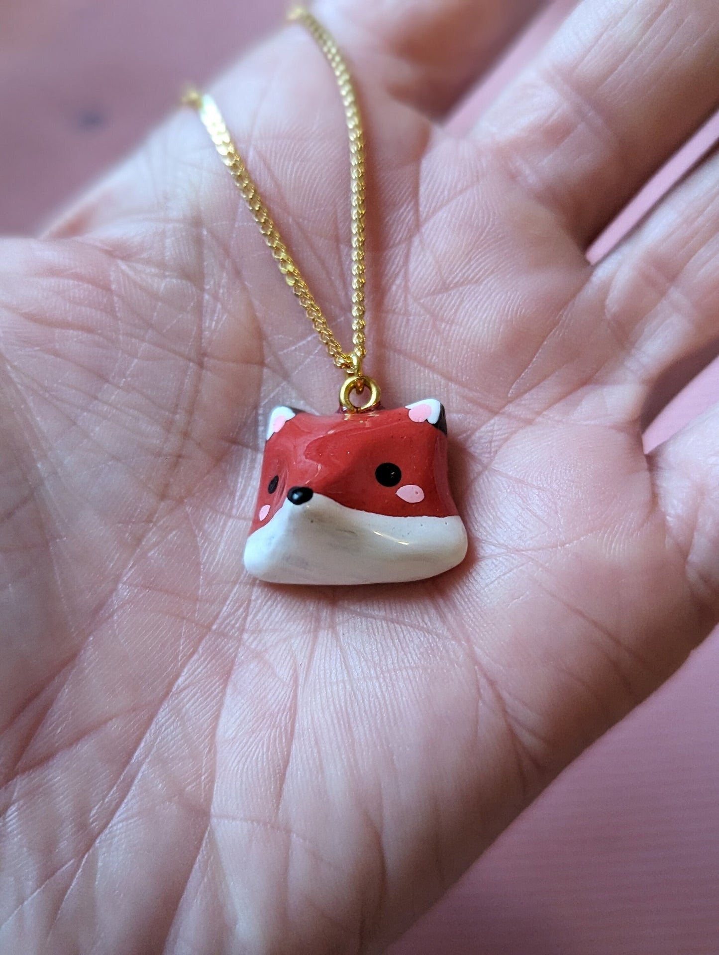 Collier orné d'une tête de renard