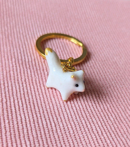 porte clé doré mini renard polaire
